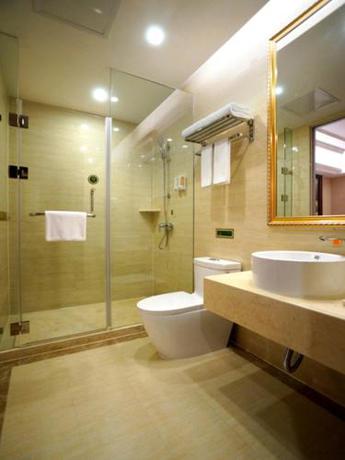 Imagen de la habitación del Hotel Ramada Encore by Wyndham Shanghai South. Foto 9