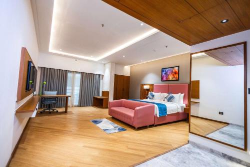Imagen de la habitación del Hotel Ramada Encore by Wyndham Viramgam. Foto 12