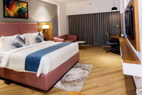 Imagen de la habitación del Hotel Ramada Encore by Wyndham Viramgam. Foto 13