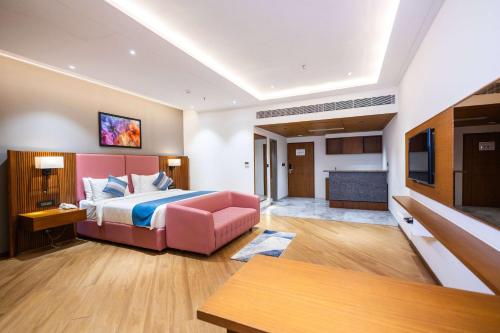 Imagen de la habitación del Hotel Ramada Encore by Wyndham Viramgam. Foto 18