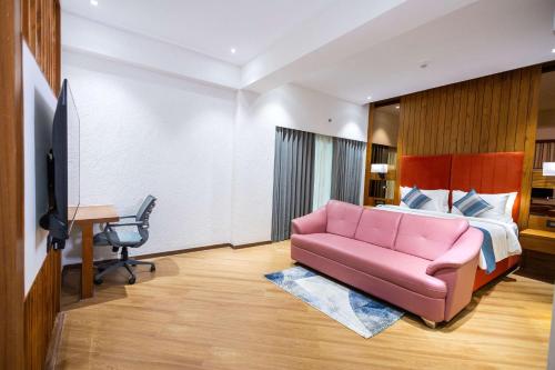 Imagen de la habitación del Hotel Ramada Encore by Wyndham Viramgam. Foto 19