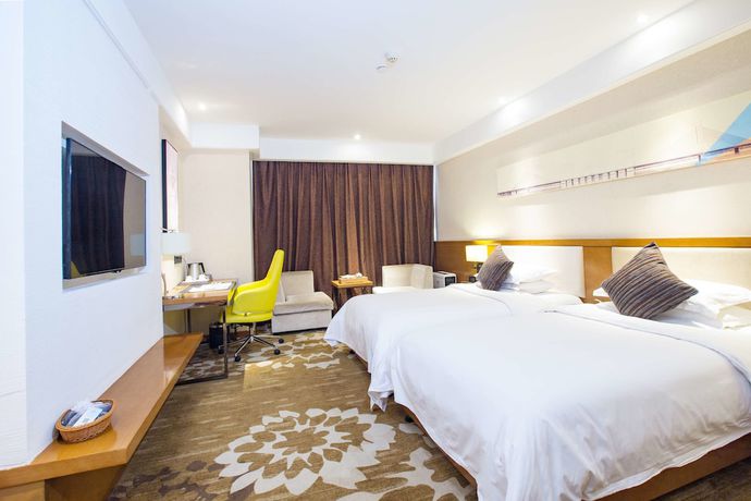 Imagen de la habitación del Hotel Ramada Encore by Wyndham Wuhan. Foto 9