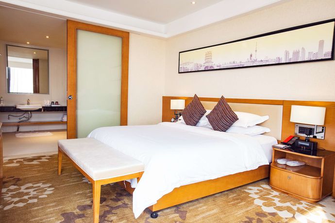 Imagen de la habitación del Hotel Ramada Encore by Wyndham Wuhan. Foto 10