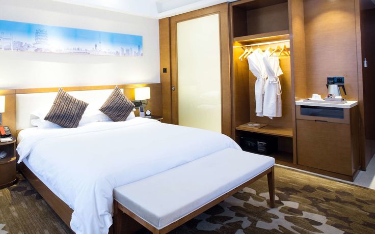 Imagen de la habitación del Hotel Ramada Encore by Wyndham Wuhan. Foto 11