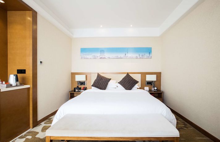 Imagen de la habitación del Hotel Ramada Encore by Wyndham Wuhan. Foto 12