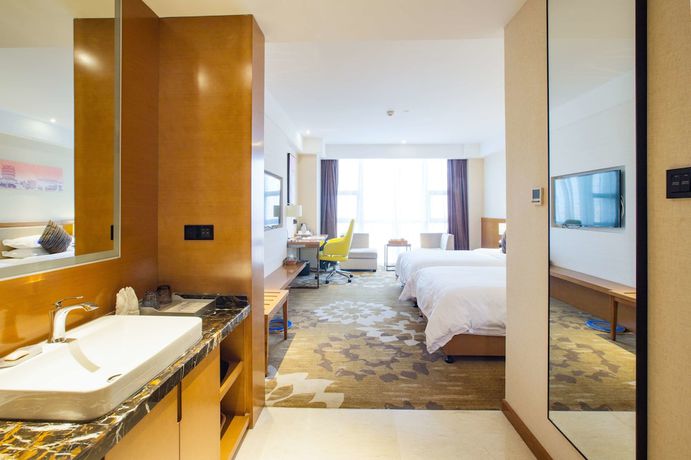 Imagen de la habitación del Hotel Ramada Encore by Wyndham Wuhan. Foto 13
