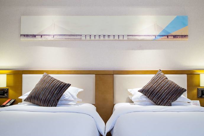 Imagen de la habitación del Hotel Ramada Encore by Wyndham Wuhan. Foto 14