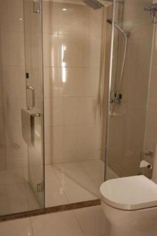 Imagen de la habitación del Hotel Ramada Encore by Wyndham Wuhan Int'l Conference Center. Foto 14
