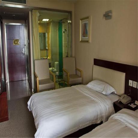 Imagen de la habitación del Hotel Ramada Encore by Wyndham Wuhan Int'l Conference Center. Foto 15