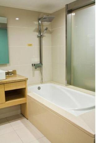 Imagen de la habitación del Hotel Ramada Encore by Wyndham Wuhan Int'l Conference Center. Foto 17