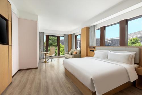 Imagen de la habitación del Hotel Ramada Encore by Wyndham Wuhan Station. Foto 6