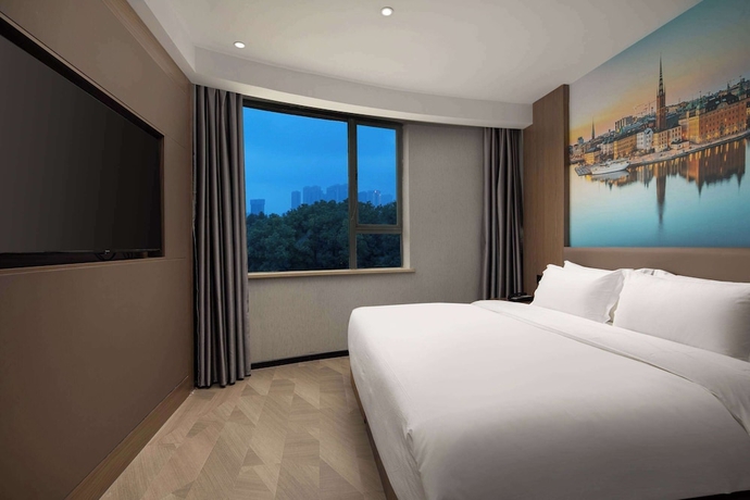 Imagen de la habitación del Hotel Ramada Encore by Wyndham Wuhan West. Foto 4