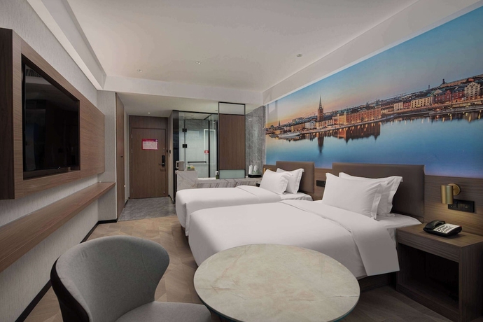 Imagen de la habitación del Hotel Ramada Encore by Wyndham Wuhan West. Foto 7
