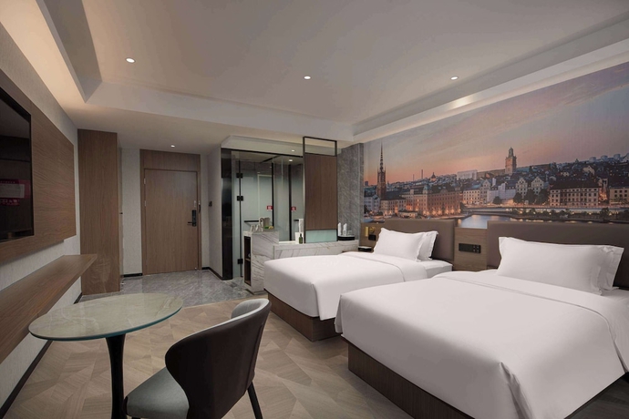 Imagen de la habitación del Hotel Ramada Encore by Wyndham Wuhan West. Foto 8