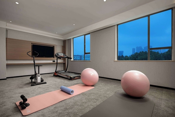 Imagen de los interiores del Hotel Ramada Encore by Wyndham Wuhan West. Foto 12