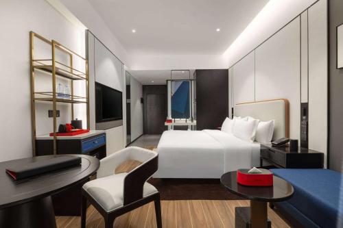 Imagen de la habitación del Hotel Ramada Encore by Wyndham Xishuangbanna Jinghong. Foto 14