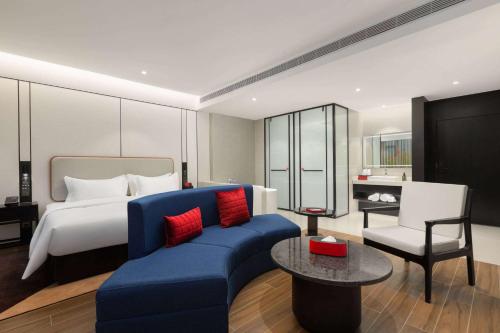 Imagen de la habitación del Hotel Ramada Encore by Wyndham Xishuangbanna Jinghong. Foto 17