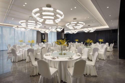 Imagen general del Hotel Ramada Encore by Wyndham Xishuangbanna Jinghong. Foto 4