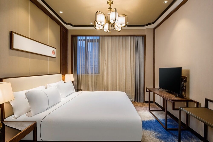Imagen de la habitación del Hotel Ramada Encore by Wyndham Zhangpu. Foto 4