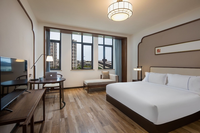 Imagen de la habitación del Hotel Ramada Encore by Wyndham Zhangpu. Foto 5