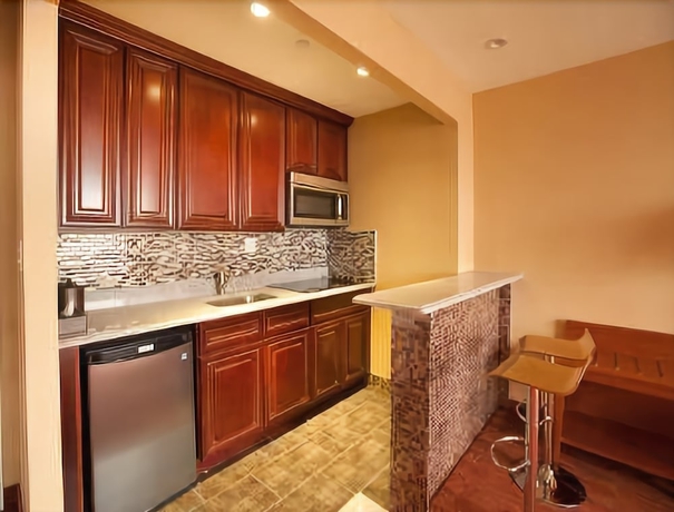 Imagen de la habitación del Hotel Ramada Flushing Queens. Foto 7