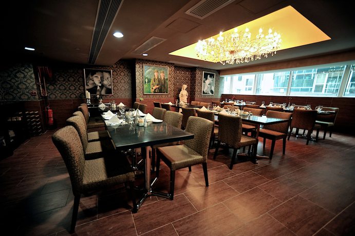 Imagen del bar/restaurante del Hotel Ramada Grand Tsim Sha Tsui. Foto 3