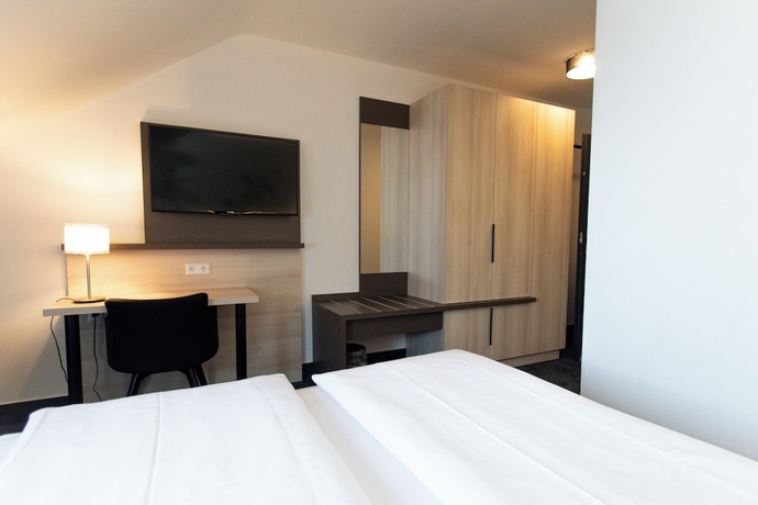 Imagen de la habitación del Hotel Ramada Hotel Lampertheim. Foto 4