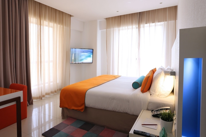 Imagen de la habitación del Hotel Ramada Hotel & Suites by Wyndham Dubai JBR. Foto 16