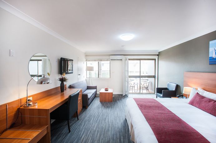 Imagen de la habitación del Hotel Ramada Hotel & Suites by Wyndham Sydney Cabramatta. Foto 2