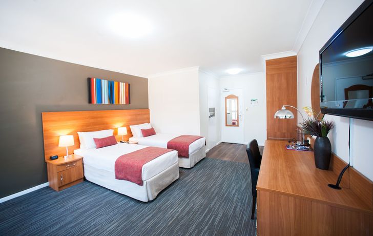 Imagen de la habitación del Hotel Ramada Hotel & Suites by Wyndham Sydney Cabramatta. Foto 7