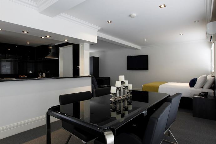 Imagen de la habitación del Hotel Ramada Hotel & Suites by Wyndham Sydney Cabramatta. Foto 12