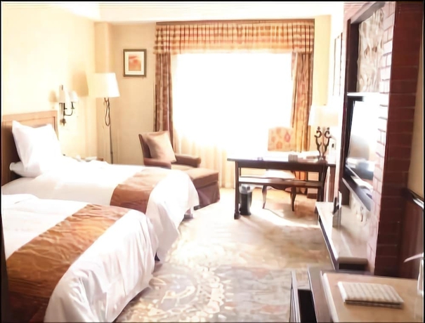 Imagen de la habitación del Hotel Ramada Kunming North. Foto 9