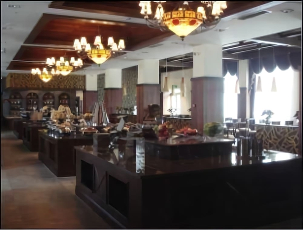 Imagen del bar/restaurante del Hotel Ramada Kunming North. Foto 5