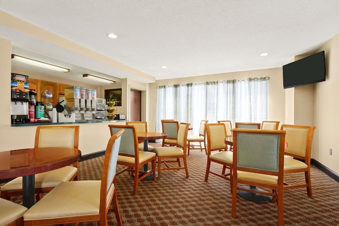 Imagen del bar/restaurante del Hotel Ramada Limited Columbia. Foto 2