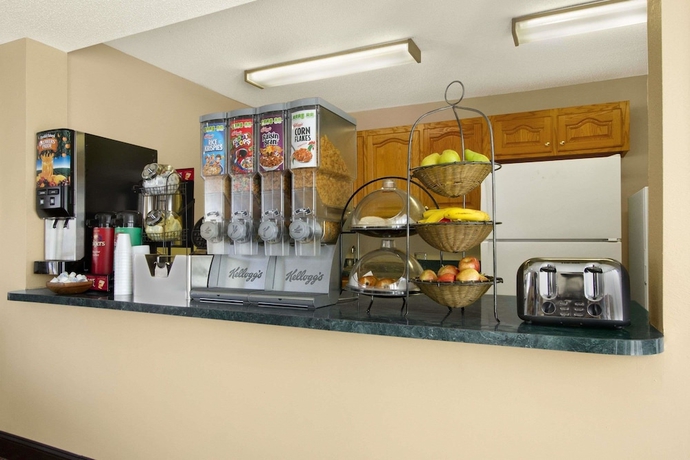 Imagen del bar/restaurante del Hotel Ramada Limited Columbia. Foto 3