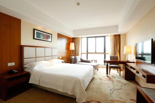 Imagen de la habitación del Hotel Ramada Nanjing. Foto 7