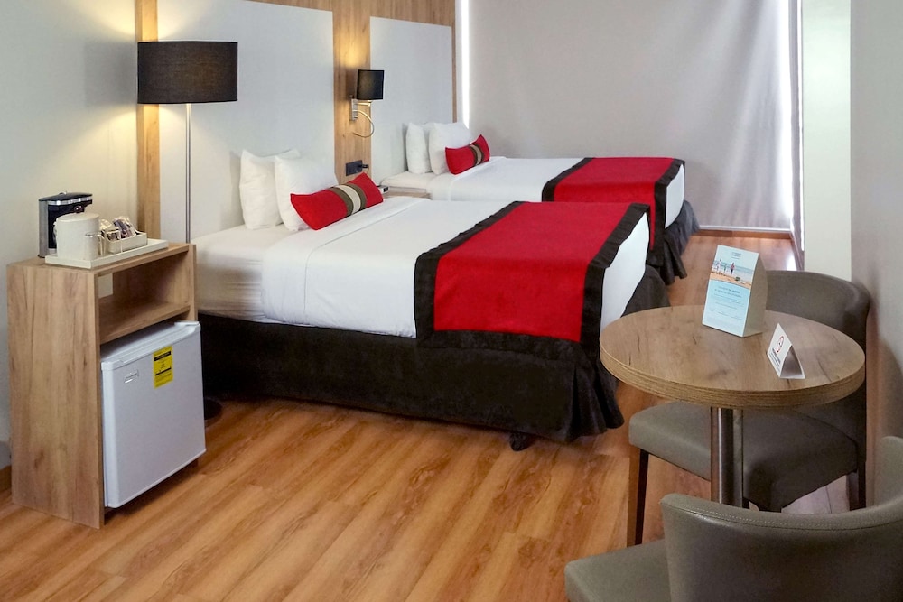 Imagen de la habitación del Hotel Ramada Panama Centro Via Argentina. Foto 12