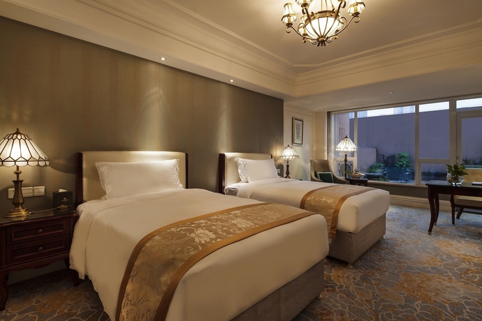 Imagen de la habitación del Hotel Ramada Plaza By Wyndham Anshun. Foto 10