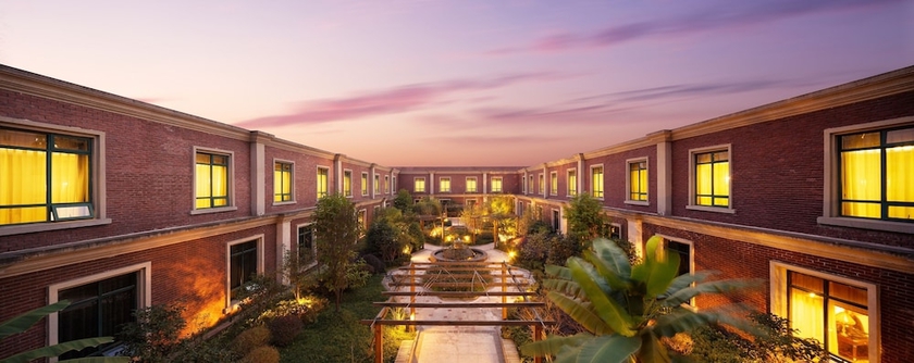 Imagen de los exteriores del Hotel Ramada Plaza By Wyndham Anshun. Foto 14