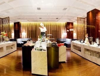 Imagen del bar/restaurante del Hotel Ramada Plaza By Wyndham Changsha South. Foto 2
