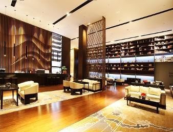 Imagen del bar/restaurante del Hotel Ramada Plaza By Wyndham Changsha South. Foto 3