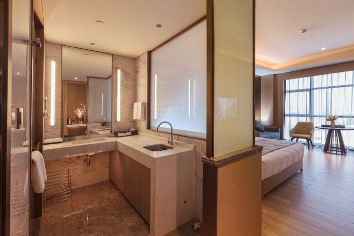 Imagen de la habitación del Hotel Ramada Plaza By Wyndham Changsha Wangcheng. Foto 9