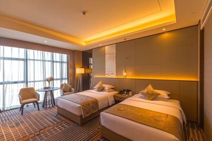 Imagen de la habitación del Hotel Ramada Plaza By Wyndham Changsha Wangcheng. Foto 10