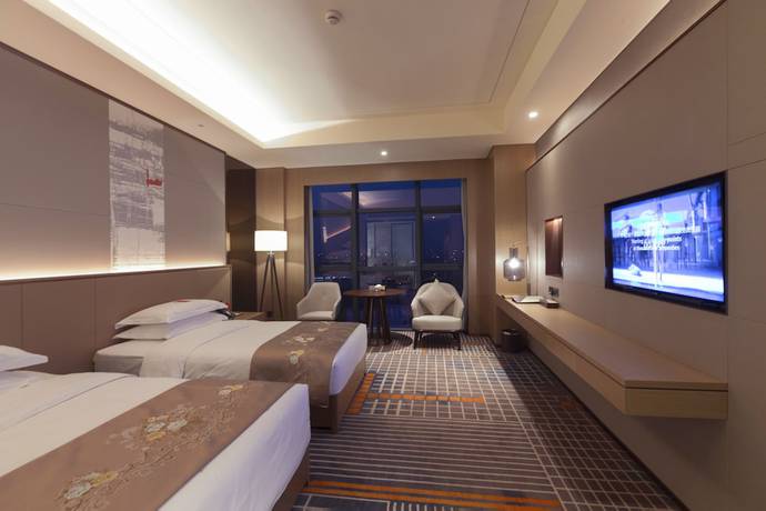 Imagen de la habitación del Hotel Ramada Plaza By Wyndham Changsha Wangcheng. Foto 11