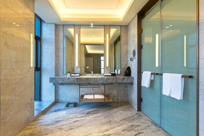 Imagen de la habitación del Hotel Ramada Plaza By Wyndham Changsha Wangcheng. Foto 20