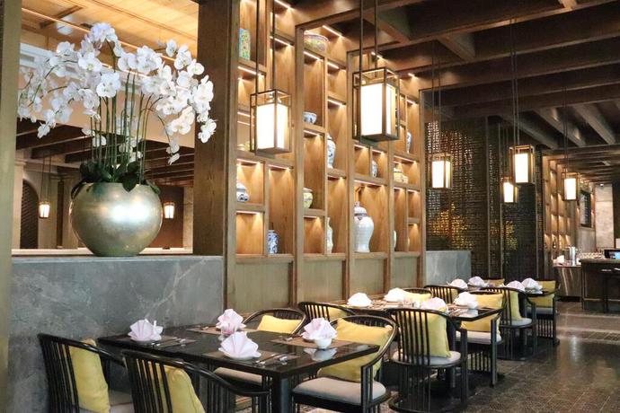 Imagen del bar/restaurante del Hotel Ramada Plaza By Wyndham Chao Fah. Foto 2