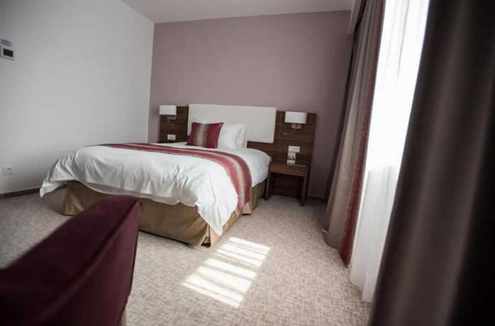 Imagen de la habitación del Hotel Ramada Plaza By Wyndham Craiova. Foto 7