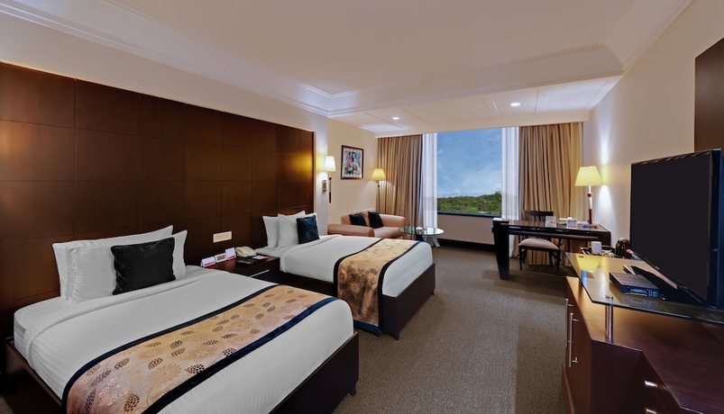 Imagen de la habitación del Hotel Ramada Plaza By Wyndham Jhv Varanasi. Foto 5