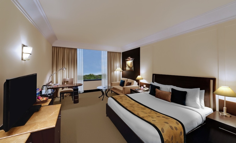 Imagen de la habitación del Hotel Ramada Plaza By Wyndham Jhv Varanasi. Foto 7