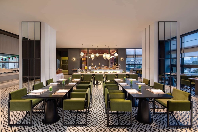 Imagen del bar/restaurante del Hotel Ramada Plaza By Wyndham Xiangtan Wanlou. Foto 4